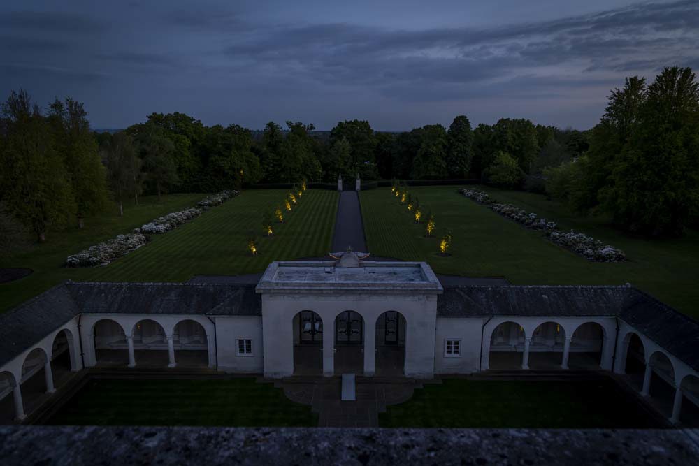 Runnymede Memorial lawn illuminated by floodlights