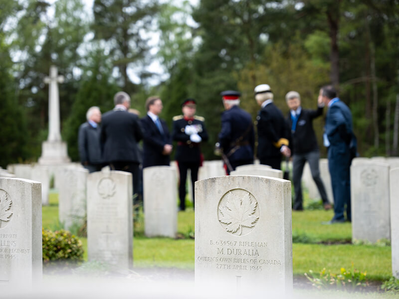 Tour guides in a CWGC cemetery