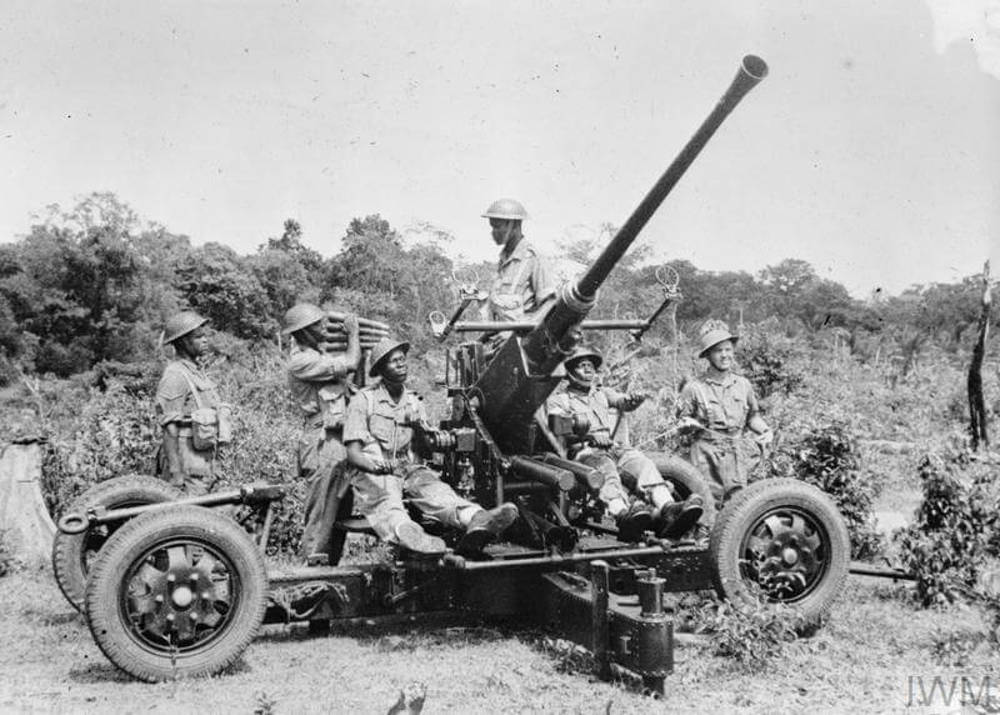 Askaris of the 11th East African Division at a battle training centre in Ceylon receiving instruction on the 40mm Bofors anti-aircraft gun, 1944.