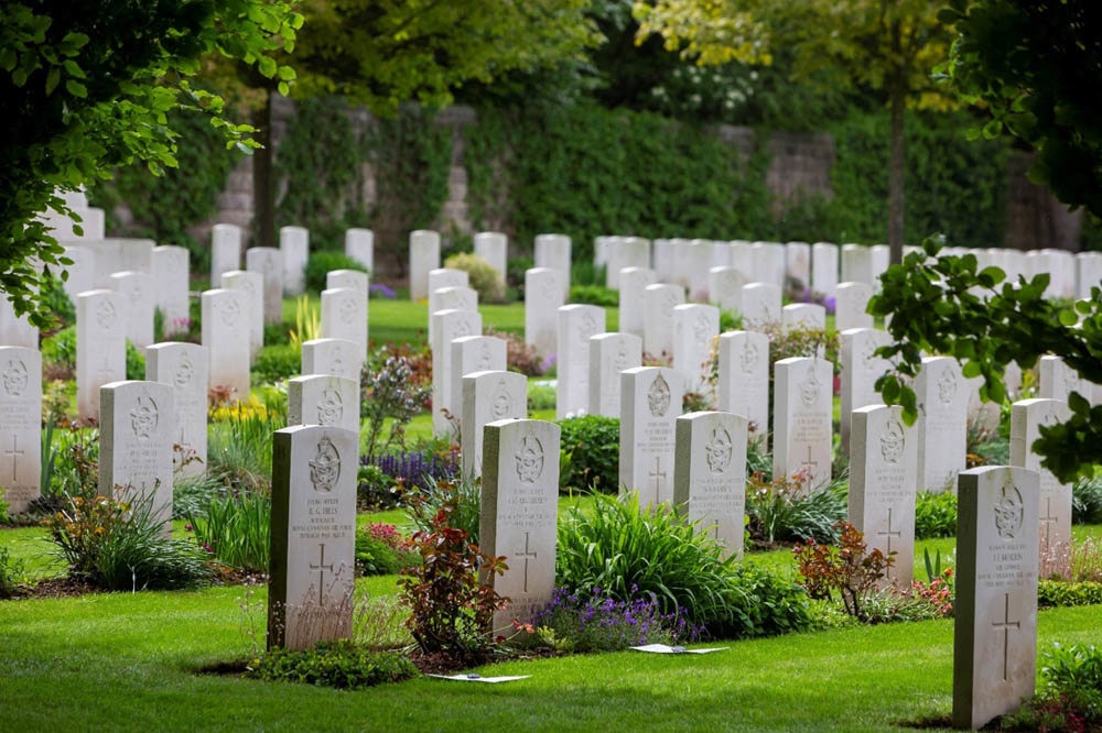 Headphones at Harrogate Stonefall Cemetery with their lush, verdant borders and lawn clearly visible.